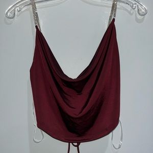 Maroon going out top with diamond studded straps. Tie back.